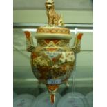 A Japanese ceramic lidded jar with foo dog finial A/F