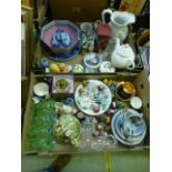 Two trays of ceramic and glassware to include water jugs, teapot figurines, plate etc.