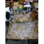 Two trays of cut and pressed glassware to include vases, drinking vessels, bowls etc.