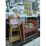 Two cuddly toys along with a cot and a high chair