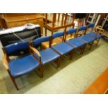 A set of four plus two mid-20th century Vanson dining chairs upholstered in a blue rexine fabric