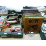 A quantity of LPs and 45 rpm records to include AC/DC etc.