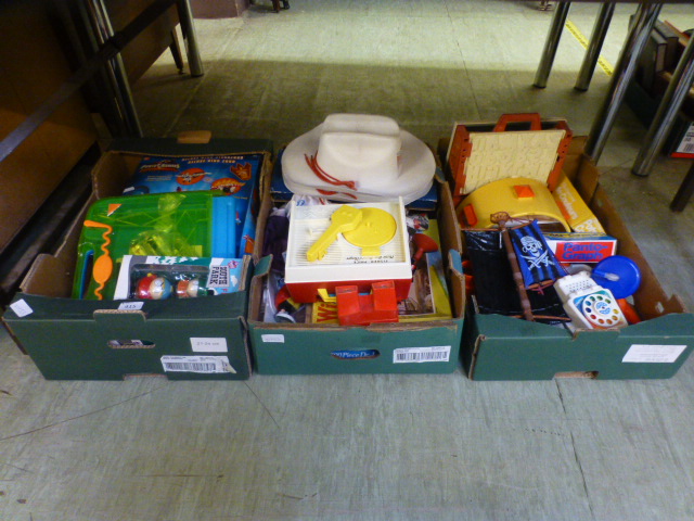 Three trays of children's items to include record player telephone etc.