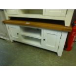 An oak topped white based low level media cabinet (38.