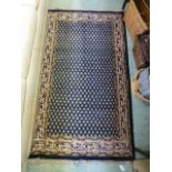 A blue ground rectangular rug