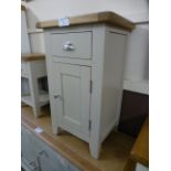 An oak topped grey based bedside cabinet (8.