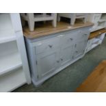 A limed oak topped grey based sideboard, three drawers over three cupboard doors (28.