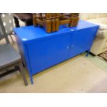 A modern blue painted industrial style two door cabinet