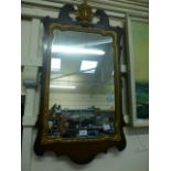 A Georgian style fret work and parcel gilt mirror