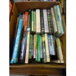 A tray of hardback books by various authors