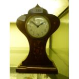 An early 20th century style mahogany cased mantle clock