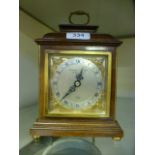 A mid 20th century clock retailed by Garrard & Co Ltd