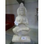 An oriental soapstone Buddha CONDITION REPORT: H.