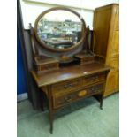 An Edwardian mahogany and satinwood banded dressing table,