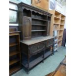 An early 20th century oak dresser,