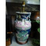 A reproduction oriental style table lamp