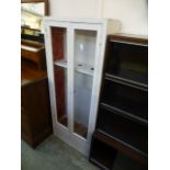 A white painted two glazed door cabinet