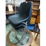 A set of three black PVC chrome legged chairs