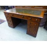 A 19th century mahogany twin pedestal desk with tooled green leather insert to top