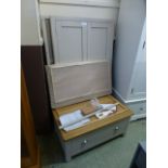 A two door wardrobe on single drawer base (5.