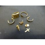 A selection of 9ct and white metal jewellery items to include ear studs, rings etc.