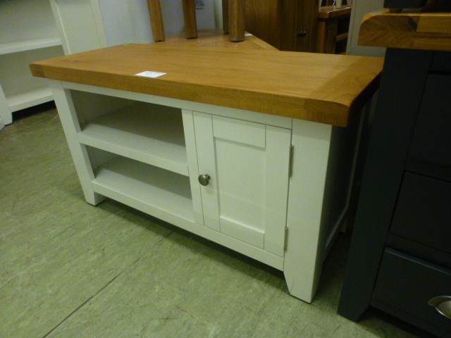 An oak topped white based media cabinet (31.