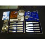 A box of assorted collectables to include flatware etc.