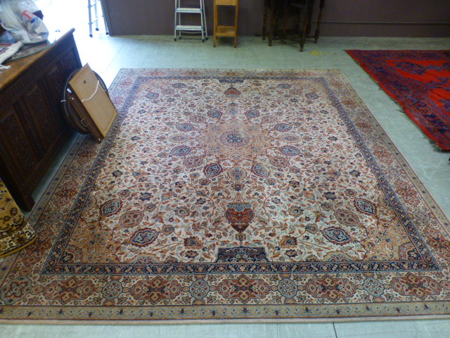 A large Persian style rug,