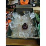 A tray of glassware to include water jugs,