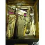 An assortment of plated flatware