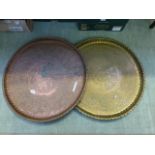 Two eastern brass and copper trays