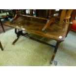 A reproduction flame mahogany occasional table
