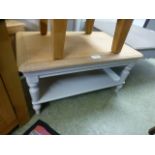 A grey painted coffee table with shelf (54.