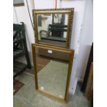 Two rectangular wall mirrors