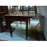 A 19th century mahogany pembroke table with barley twist supports