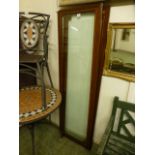 A pair of rosewood doors with glass inserts