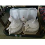 A tray containing white ceramic tureens, ceramic models of doves etc.