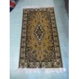 A modern Belgian Persian style brown ground rug,
