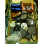 A tray containing an assortment of fishing reels