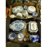 Two trays of blue and white ceramic tableware to include tureens, meat dishes etc.