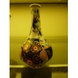 An imari style bud vase