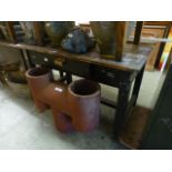 An early 20th century wooden work table with single drawer