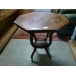 An Edwardian rosewood inlaid octagonal occasional table with under tier A/F
