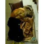 A tray containing fur hats, crocodile style handbag etc.