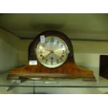 A walnut veneered Westminster chime mantle clock CONDITION REPORT: Pendulum present