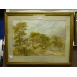 A framed and glazed watercolour of country cottage scene,