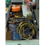 Two trays and a metal cantilever toolbox containing tools, saws etc.