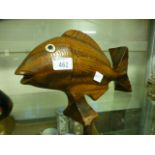 A carved wooden fish