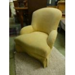 A yellow cut fabric upholstered nursing chair