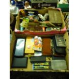 Two trays of assorted fishing equipment to include floats, hooks, flies etc.
